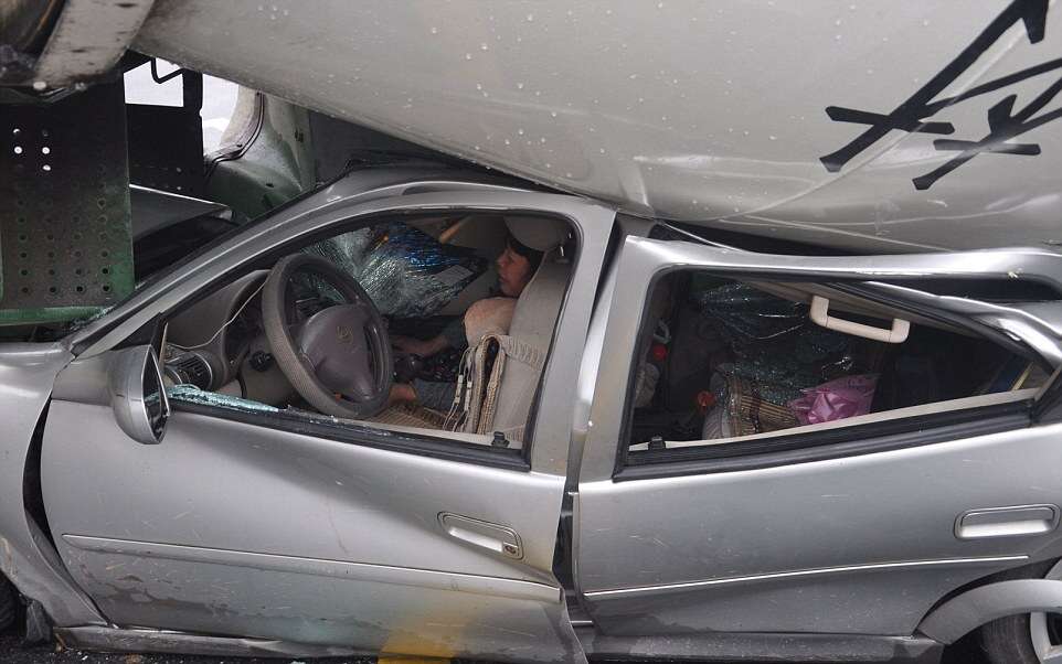 Woman Survives After Her Car is Flattened by a Cement Mixer, Hangzhou, Zhejiang Province, China - 18 Aug 2014