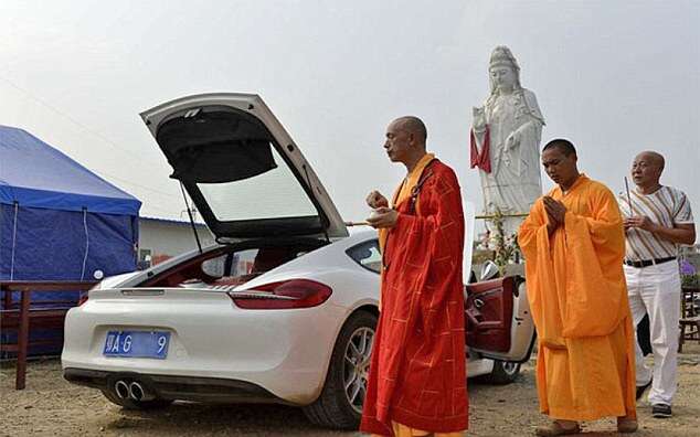 Monk blesses a Porsche, stirs up cynicism online