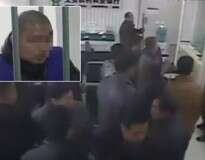 Ladrão invade banco para roubar dinheiro e ao tentar sair encontra multidão formando parede humana para evitar que ele fugisse