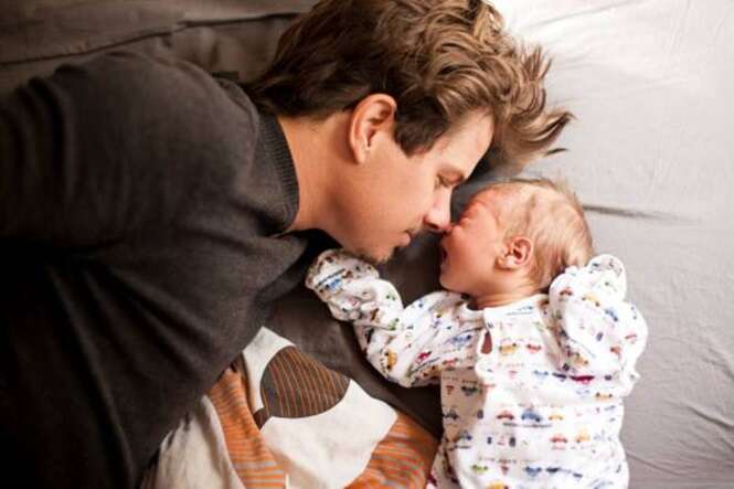 Father and newborn baby