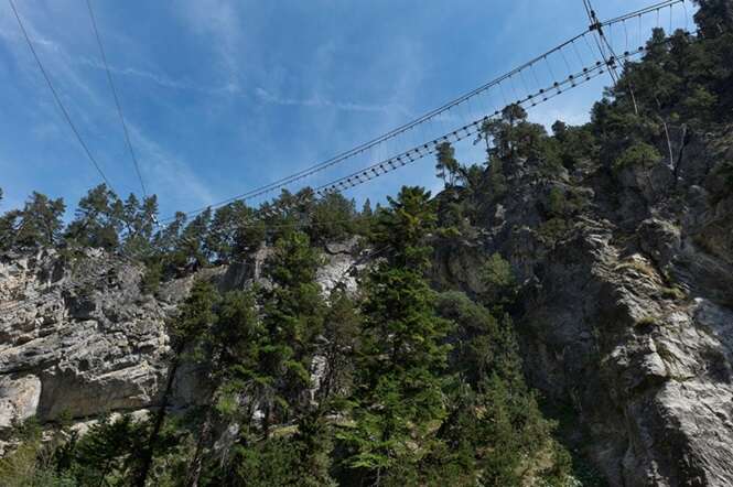 a Tibetan bridge over the St. Gervasio gorges, Susa valley, Piedmont, Italy