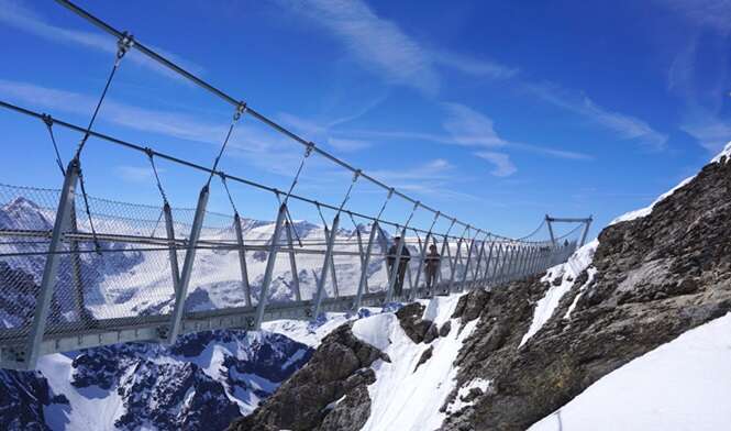 Suspended walkway over snow mountains Titlis, Engelberg, Switzerland