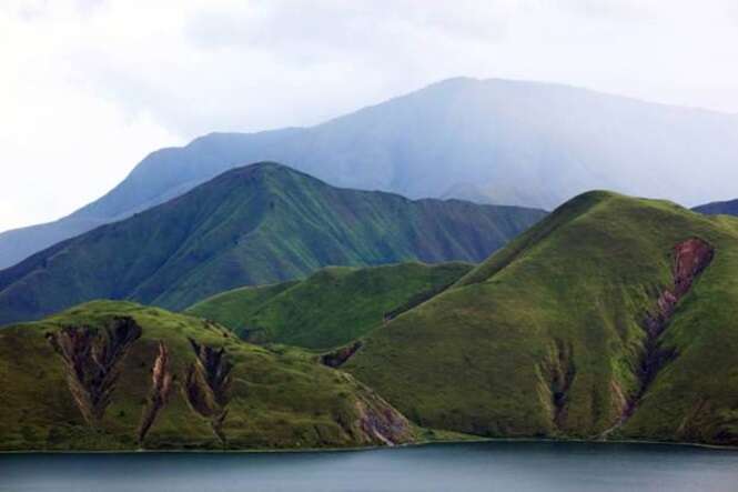 Overview of steep mountains surrounding Lake Toba.