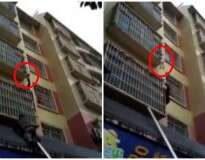 Vídeo mostra momento em que pedestres se arriscam para salvar bebê preso pela cabeça em varanda no terceiro andar