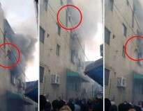 Vídeo: mãe desesperada joga os três filhos da janela de prédio em chamas em tentativa de salvá-los